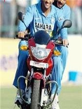 game pic for dhoni in bike   V5